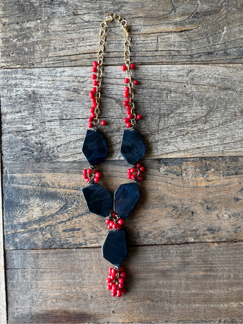 Gold Chain Necklace with Black Stones and Red Bead Accents
